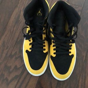 Black and yellow Jordan’s